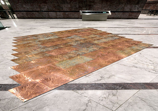 Copper floor designed by Grenville Davey, these individual panels were manufactured by the chemical etching process, by Etch Tech Ltd.